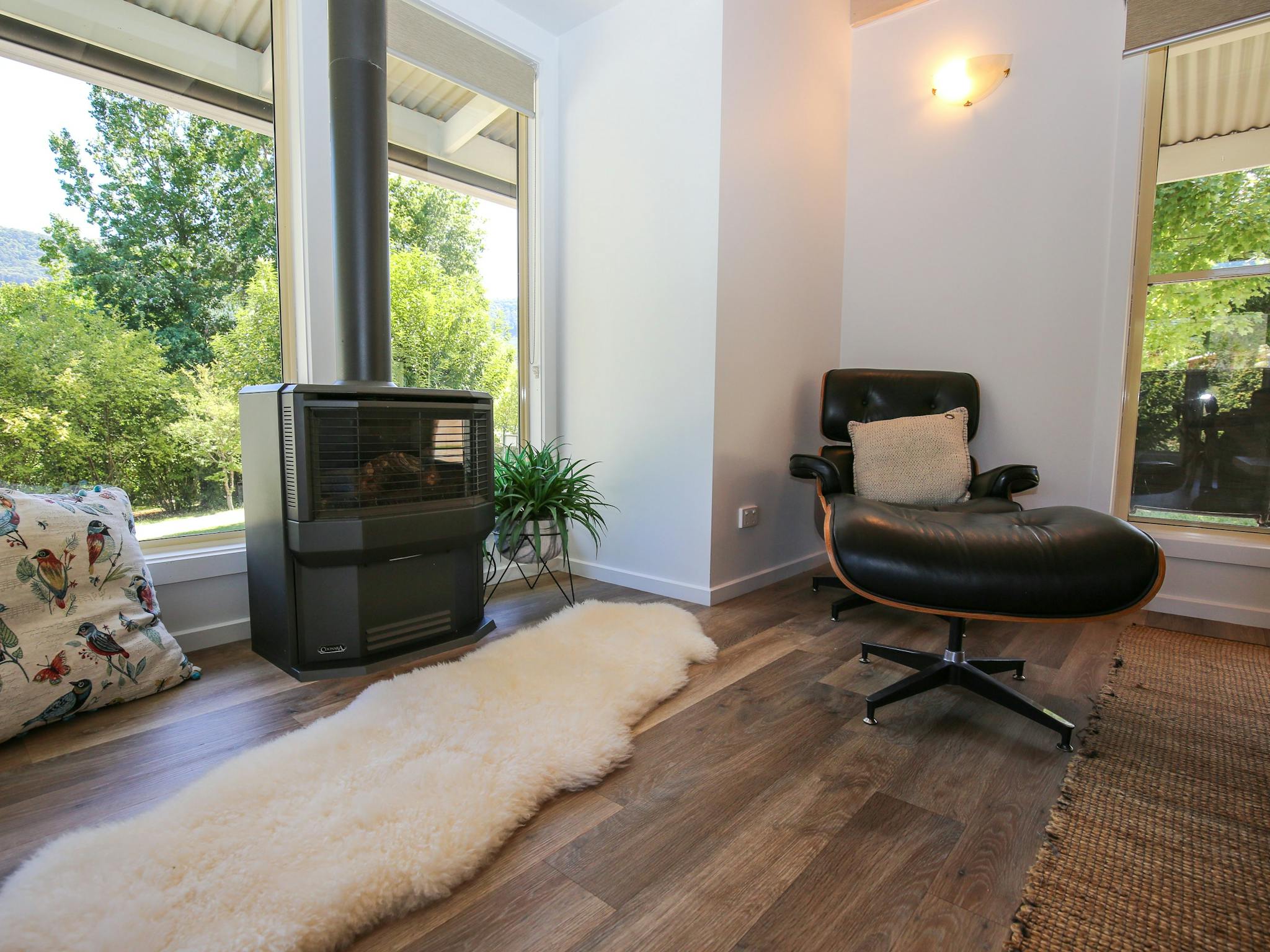 Abby's Cottage fireplace and lounge chair