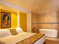 Bedroom with private bath tub