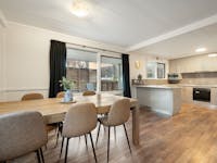Dining room and kitchen. Very spacious and includes a dishwasher and super large pantry.