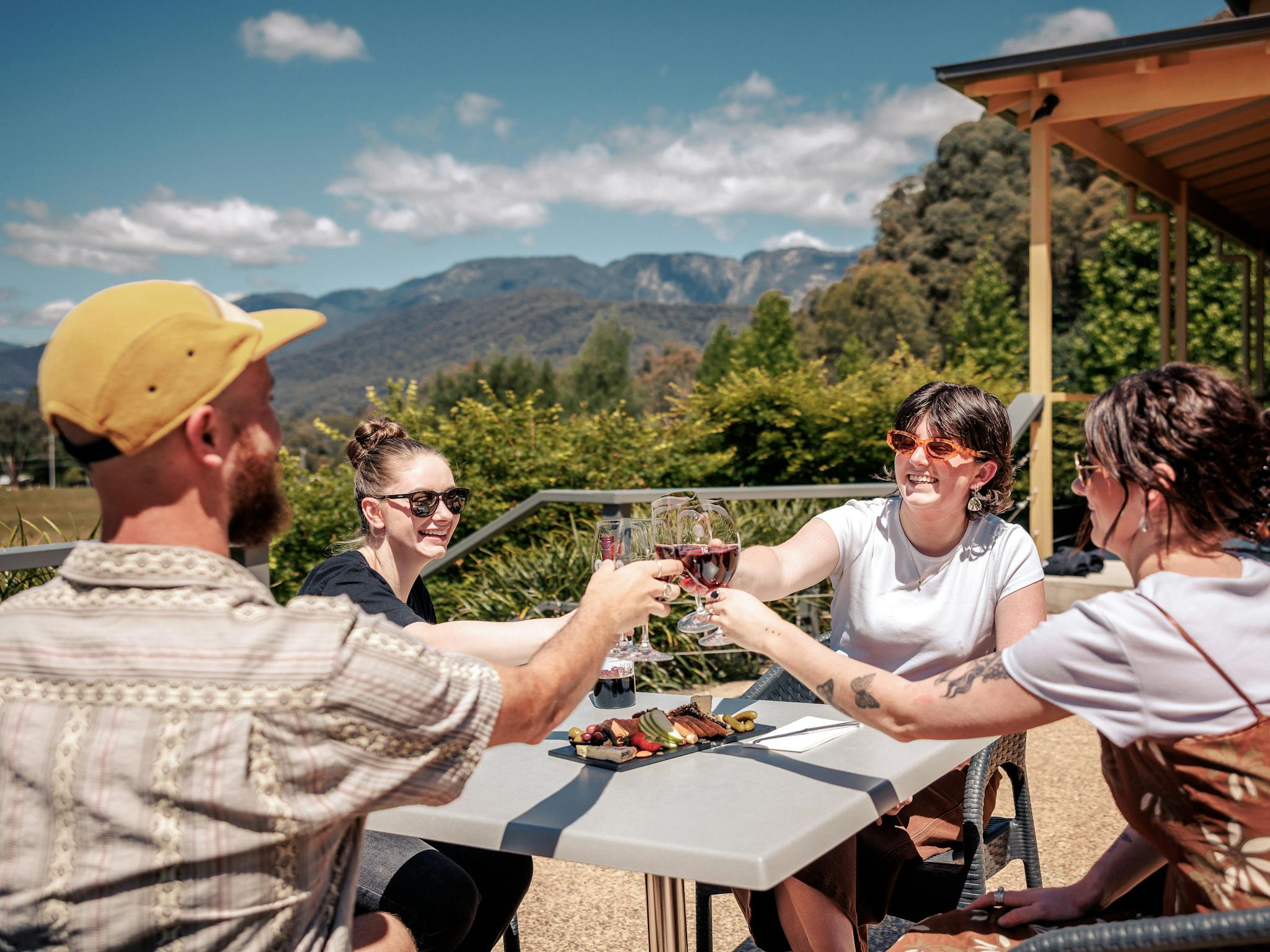 Young people enjoying food, wine and views at RInger Reef