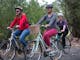 Three cyclists enjoying a bike ride