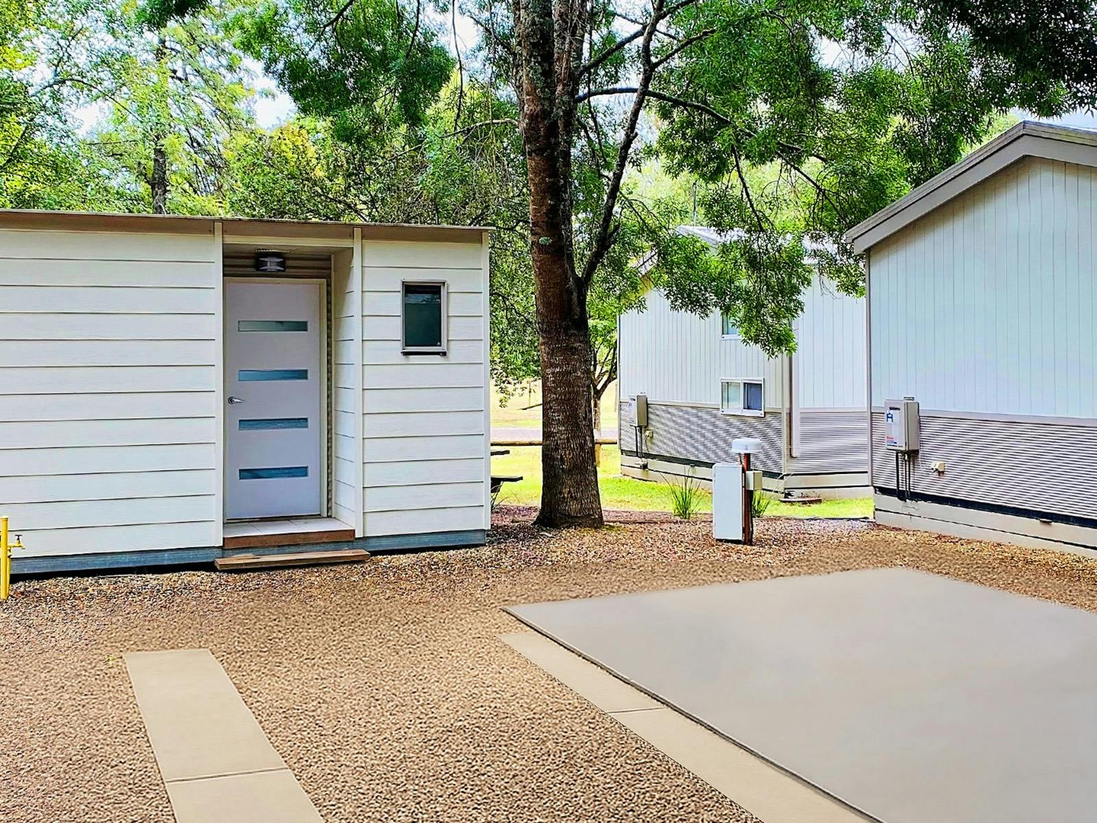 An ensuite site with its own shower, toilet, and vanity offers the ultimate in camping convenience a