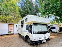 An ensuite site with its own shower, toilet, and vanity offers the ultimate in camping convenience.
