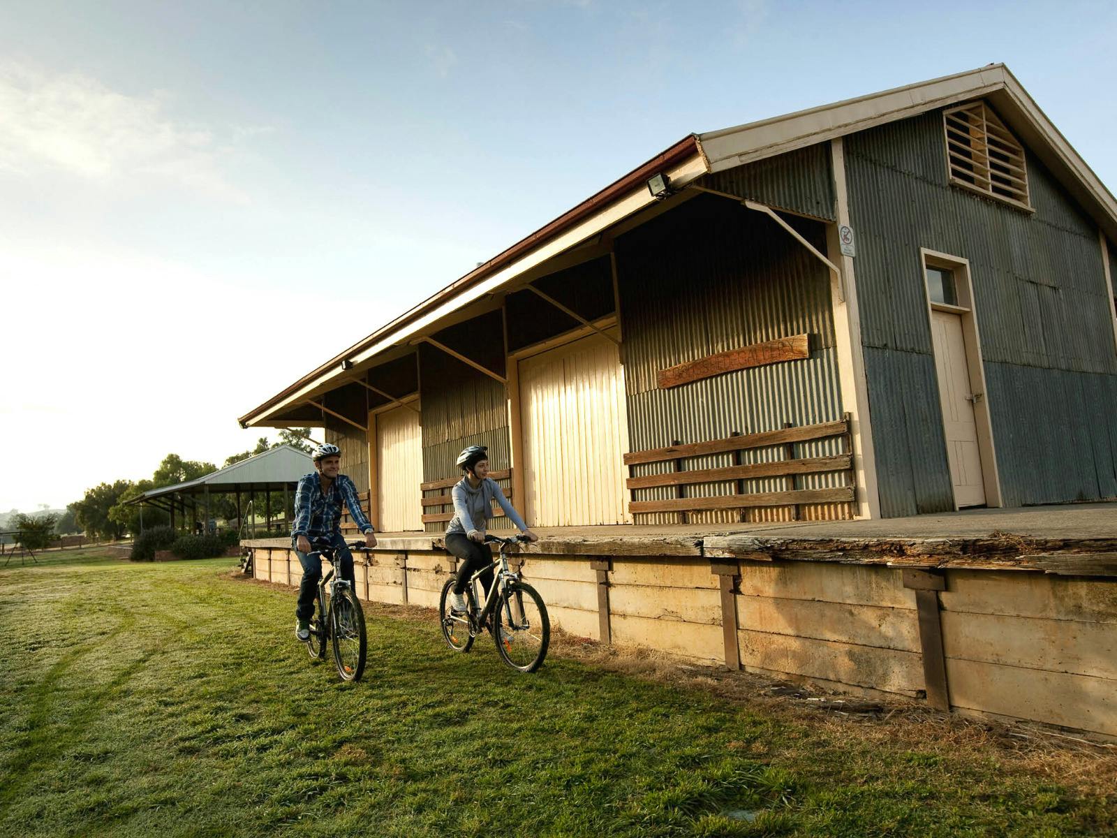 Cyclists near Yea Station in Victoria's high country.