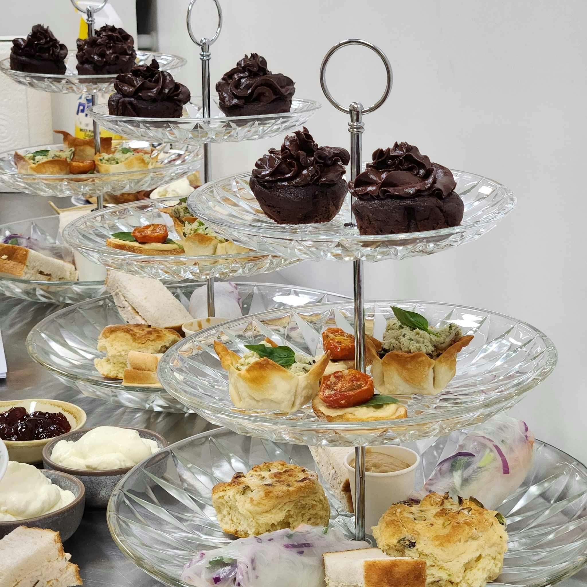 Spring High Tea food stands with delectable bites both savoury and sweet to suit the season