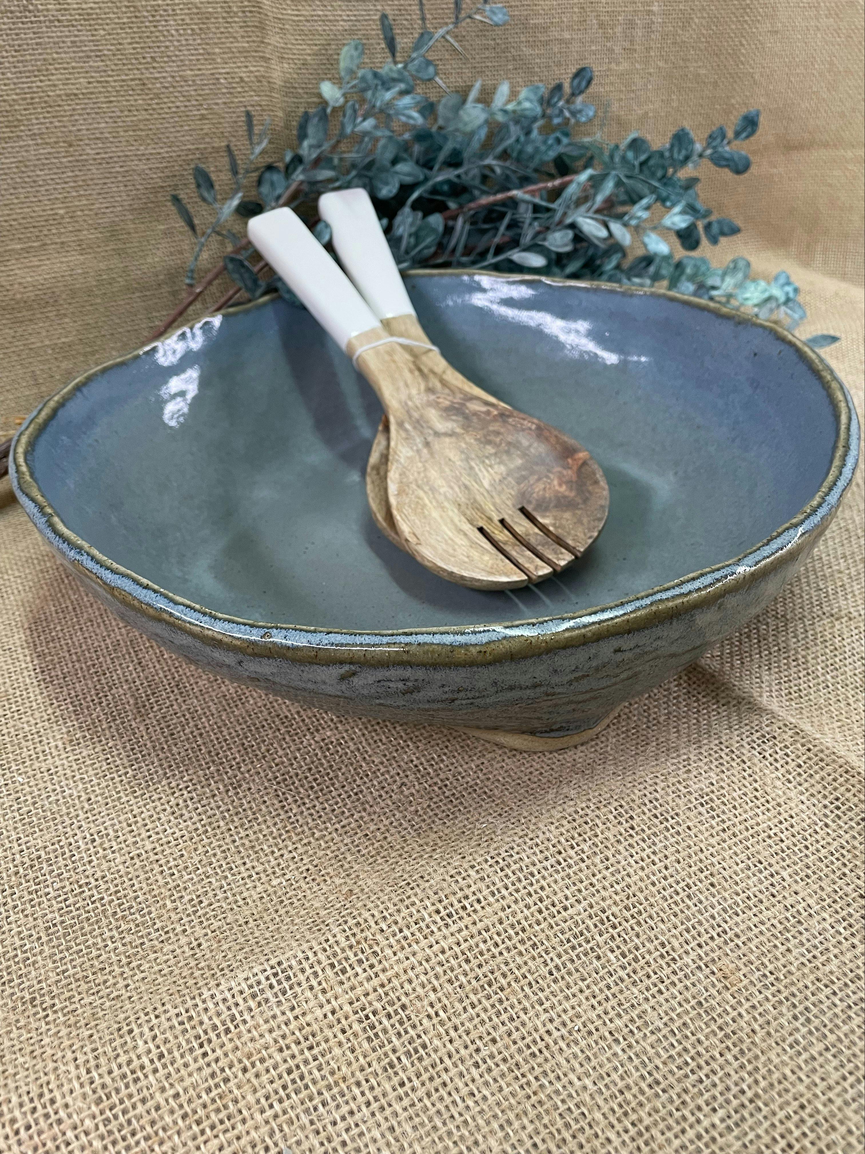 Image showing a pottery salad bowl with timber salad servers