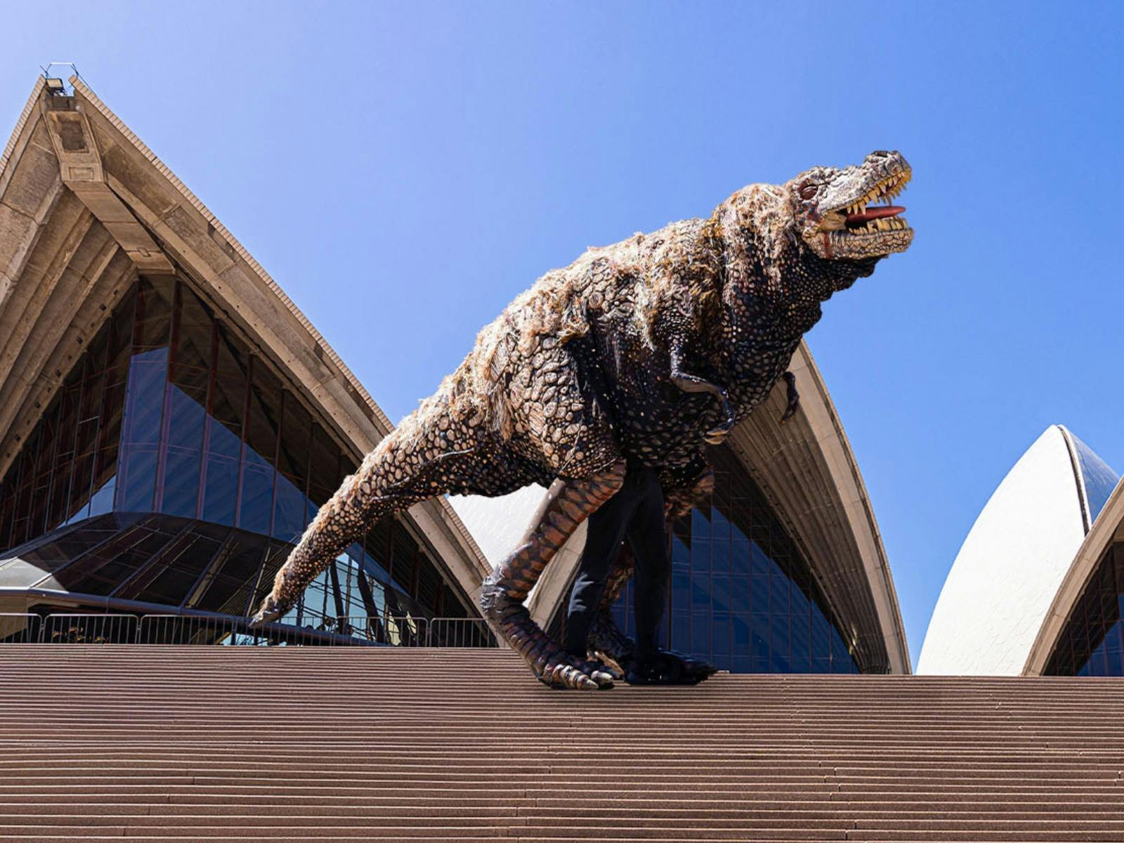 Dinosaur puppet on Sydney Opera House steps