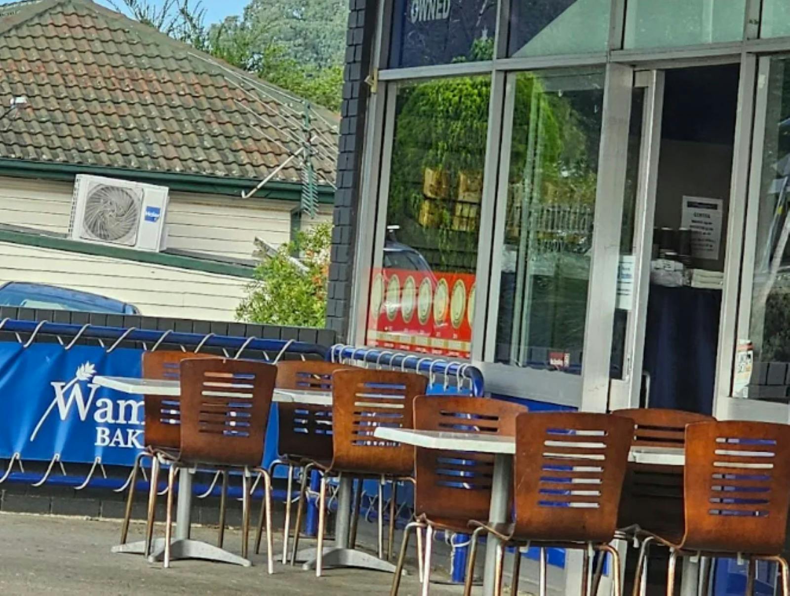 Bakery shopfront with seating at the front