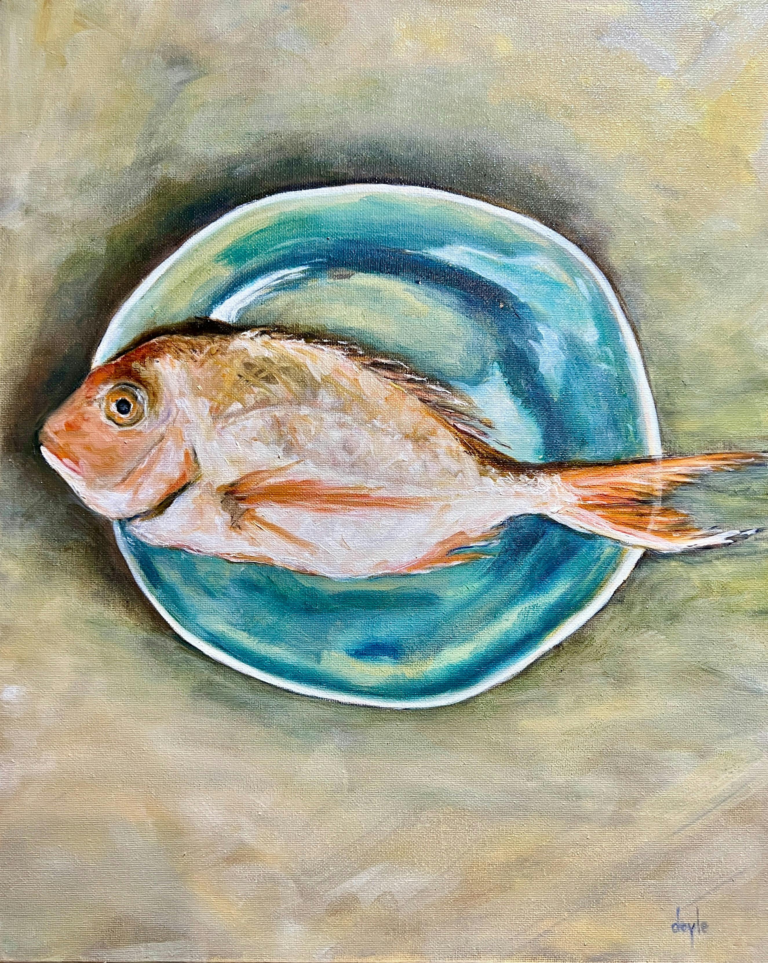 Painting of fish on a shiny blue plate