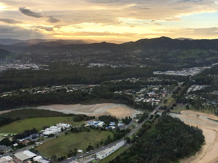 Sunset with ranges in the background overlooking Coffs Harbour, taken from a Helicopter