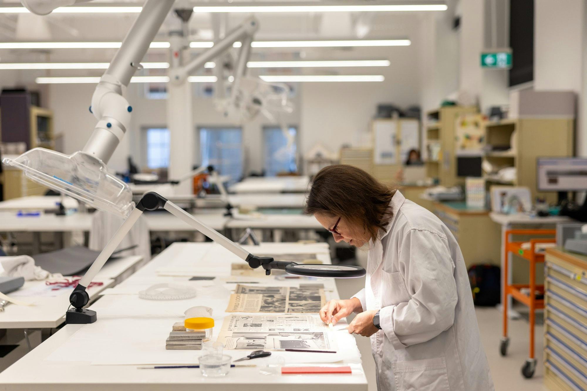 A woman working in a conservation lab
