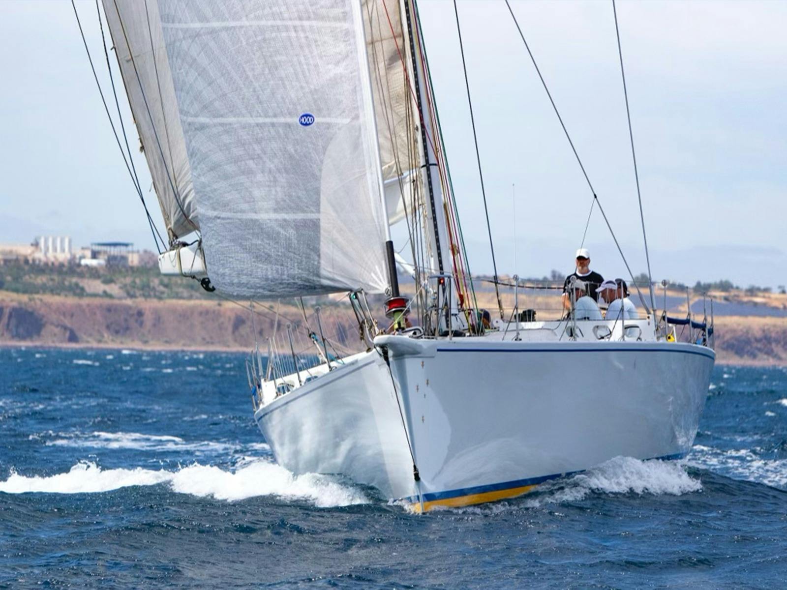 Taking in the coast on an 80 foot maxi yacht