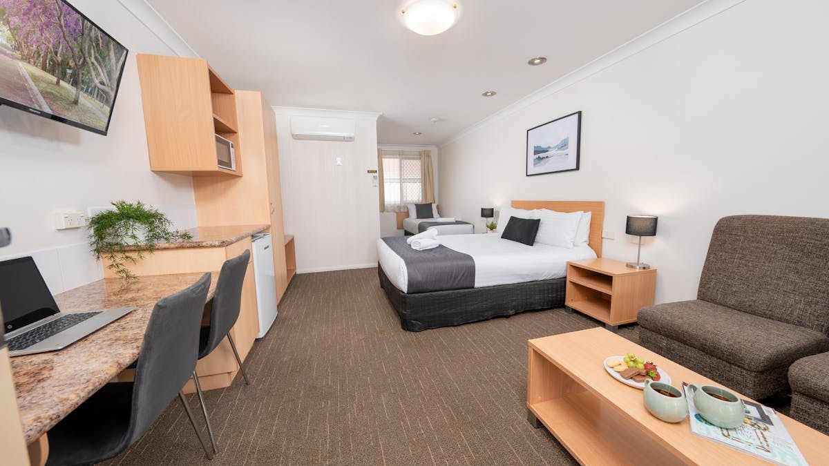 Motel Room with Queen Bed and Single Bed