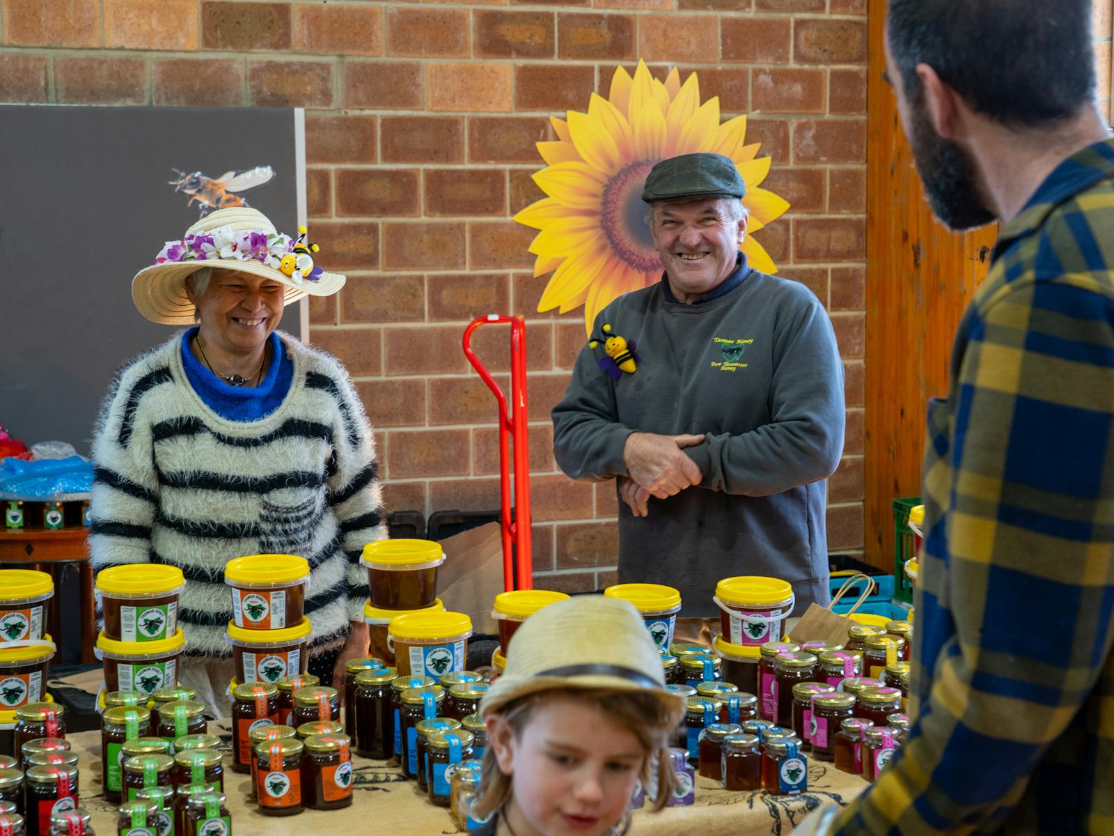 Wonderful staff from Tasman Honey selling their wide range of assorted honey