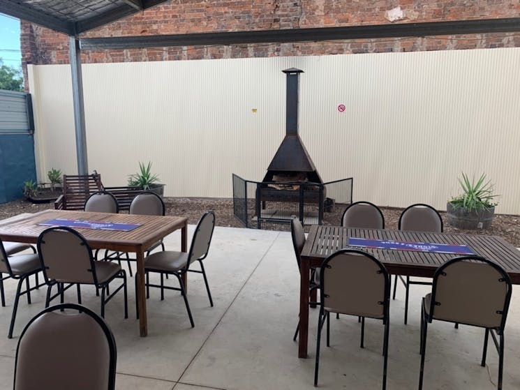A large family friendly beer barden  with a wood fire outdoors is a great setting for gatherings.