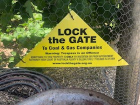 lock the gate sign
