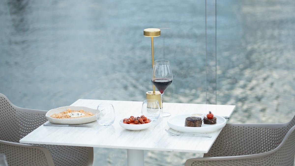 Waterfront restaurant setting at MĀRE on the Gold Coast
