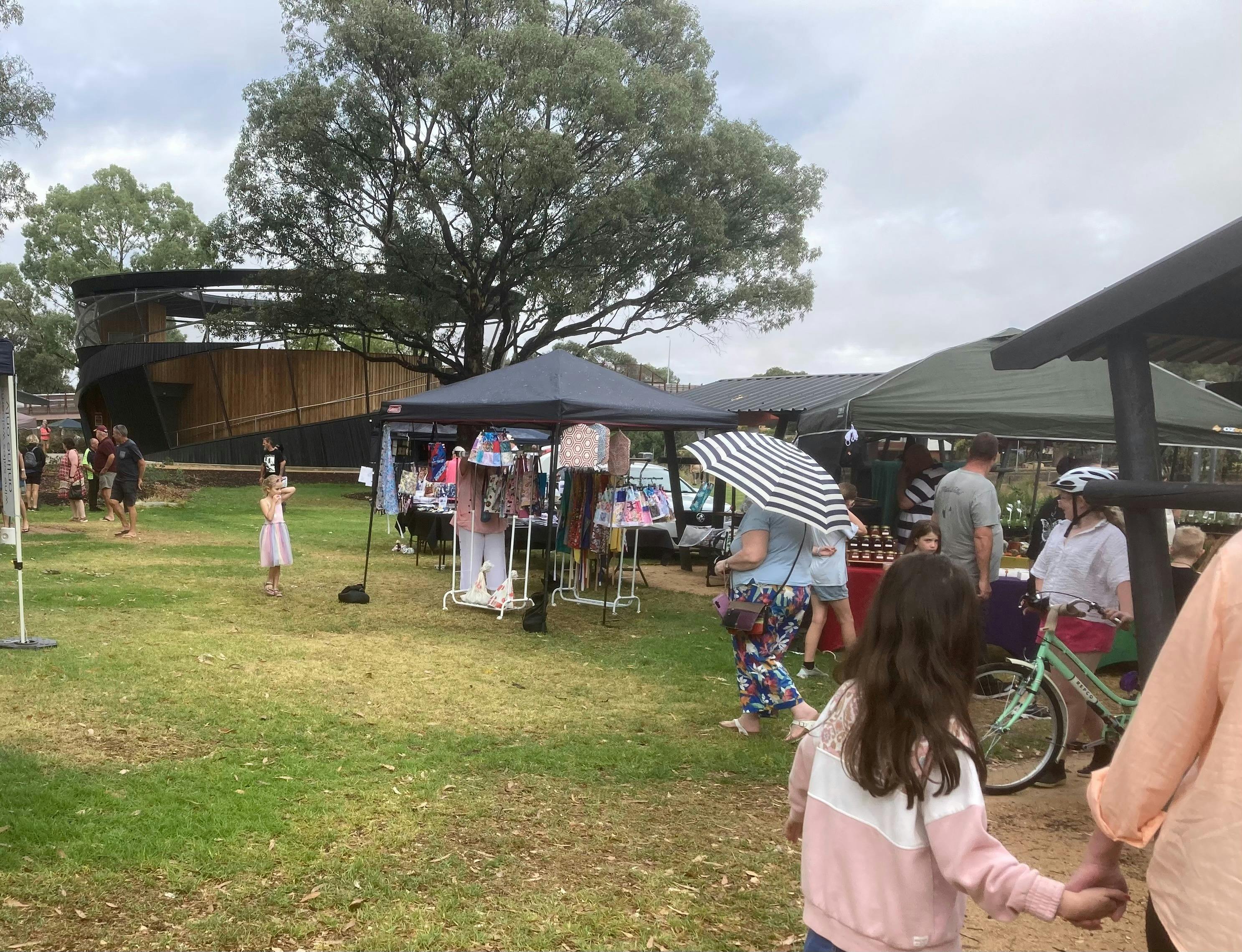 People enjoying an outdoor market