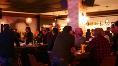 People enjoying a night out in PJs back room