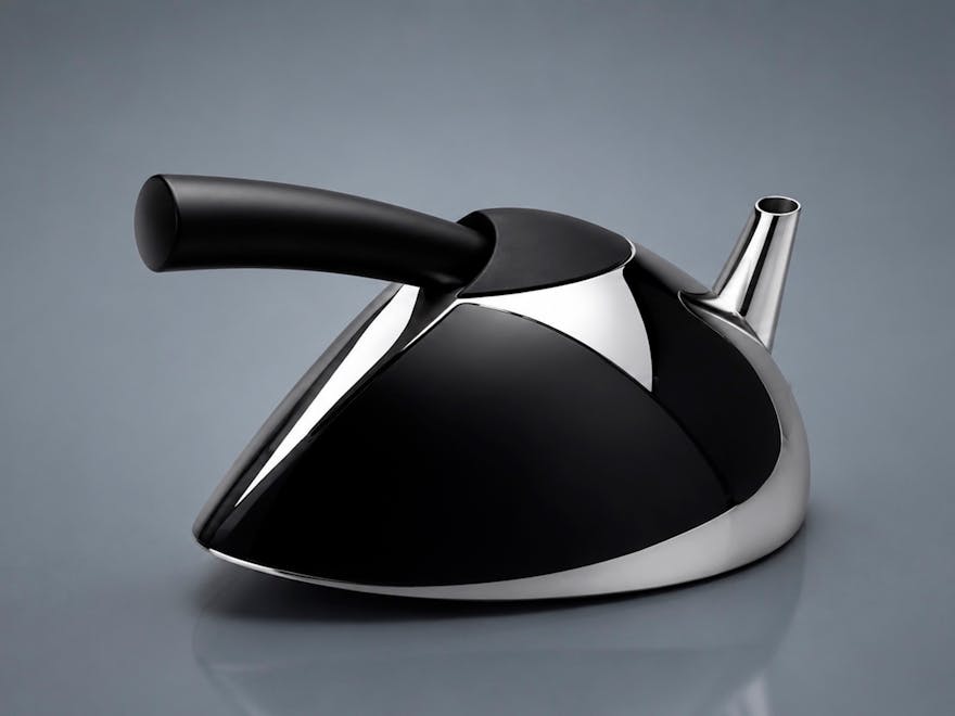 silver and black teapot with a long straight black handle