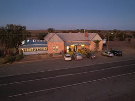 Photo of The Cradock Hotel. An old stone hotel with a modern dining room.