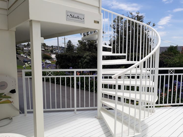 Spiral stairs entry to Shutters by the Sea