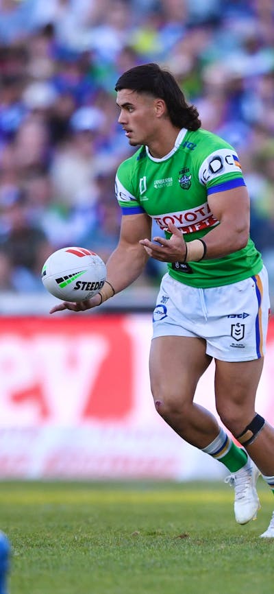 Canberra Raiders player Kaeo Weekes passing the ball.