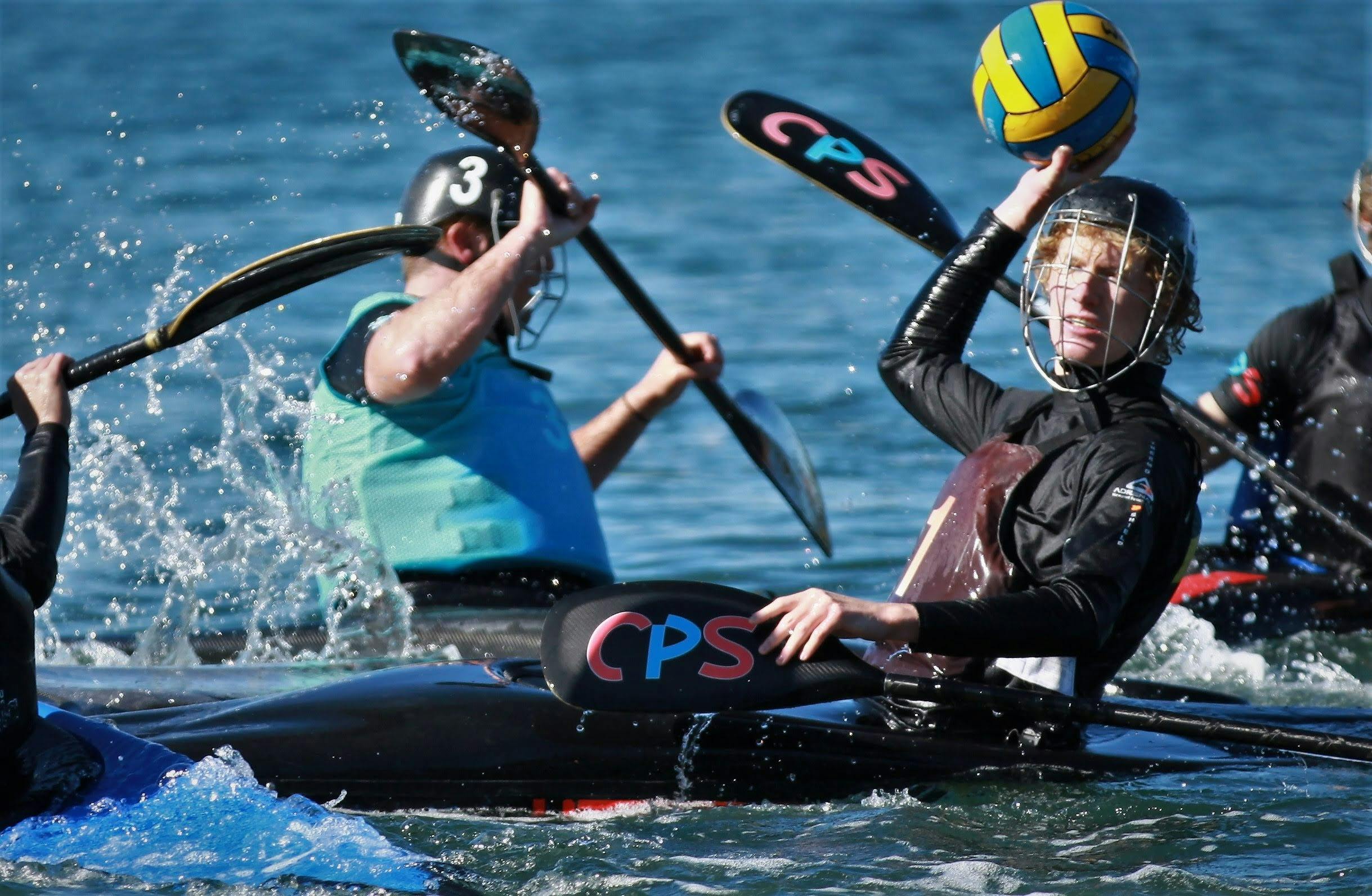 A player hold the ball up to pass