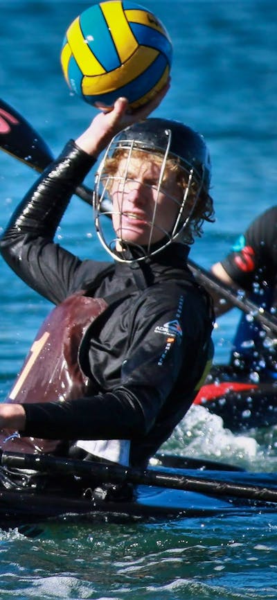 A player hold the ball up to pass