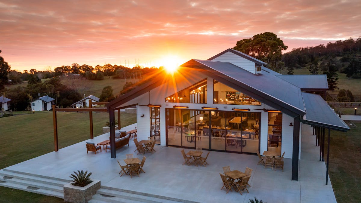 Exterior photo of The Paddock restaurant, Hazelwood Estate at sunset Exterior photo of The Paddock restaurant, Hazelwood Estate at sunset