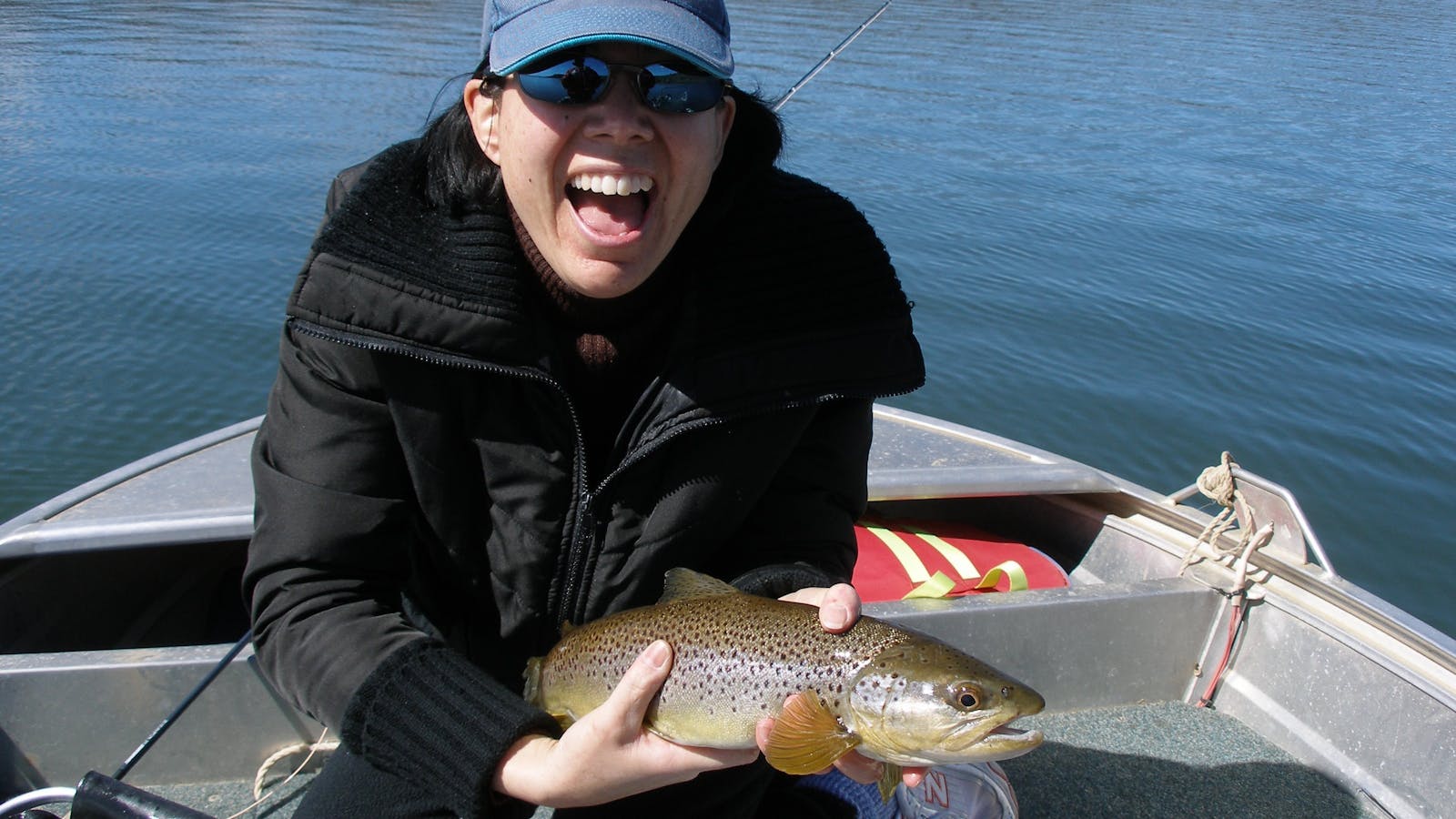 A beautiful brown trout caught by a happy client on Arthurs Lake