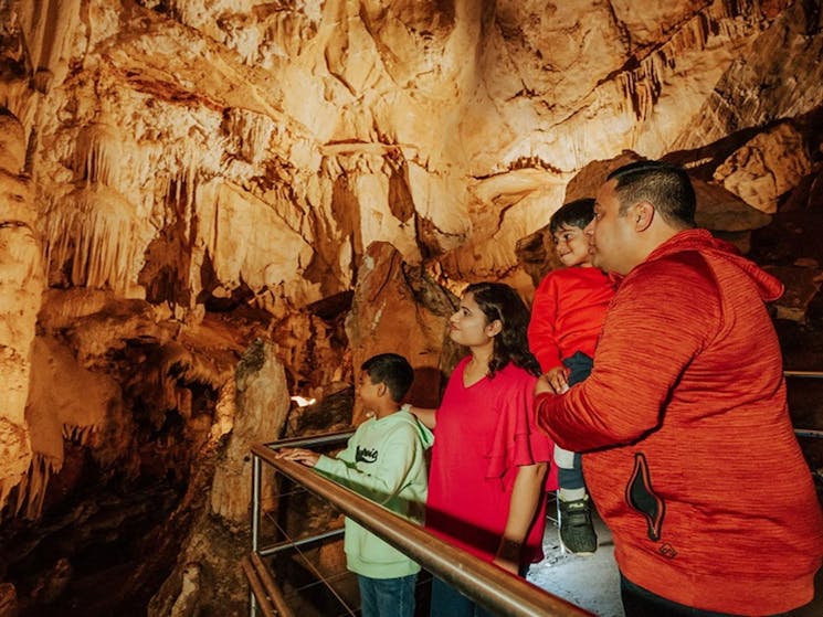 Visitors explore Fig Tree Cave on a self-guided tour. Credit: Remy Brand/DPE &copy; Remy Brand