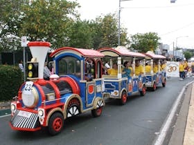 Cute train rides carrying participants in the Beenleigh Cane Festival