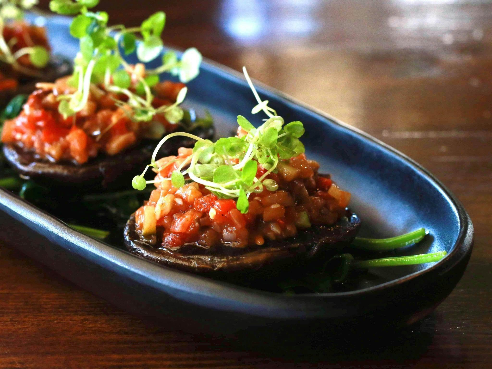 Roasted mushrooms filled with vege ragu & fresh herbs