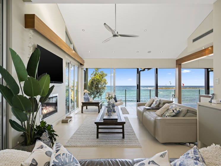 Luxury Living with ceiling fans, tv, lounge and ocean views