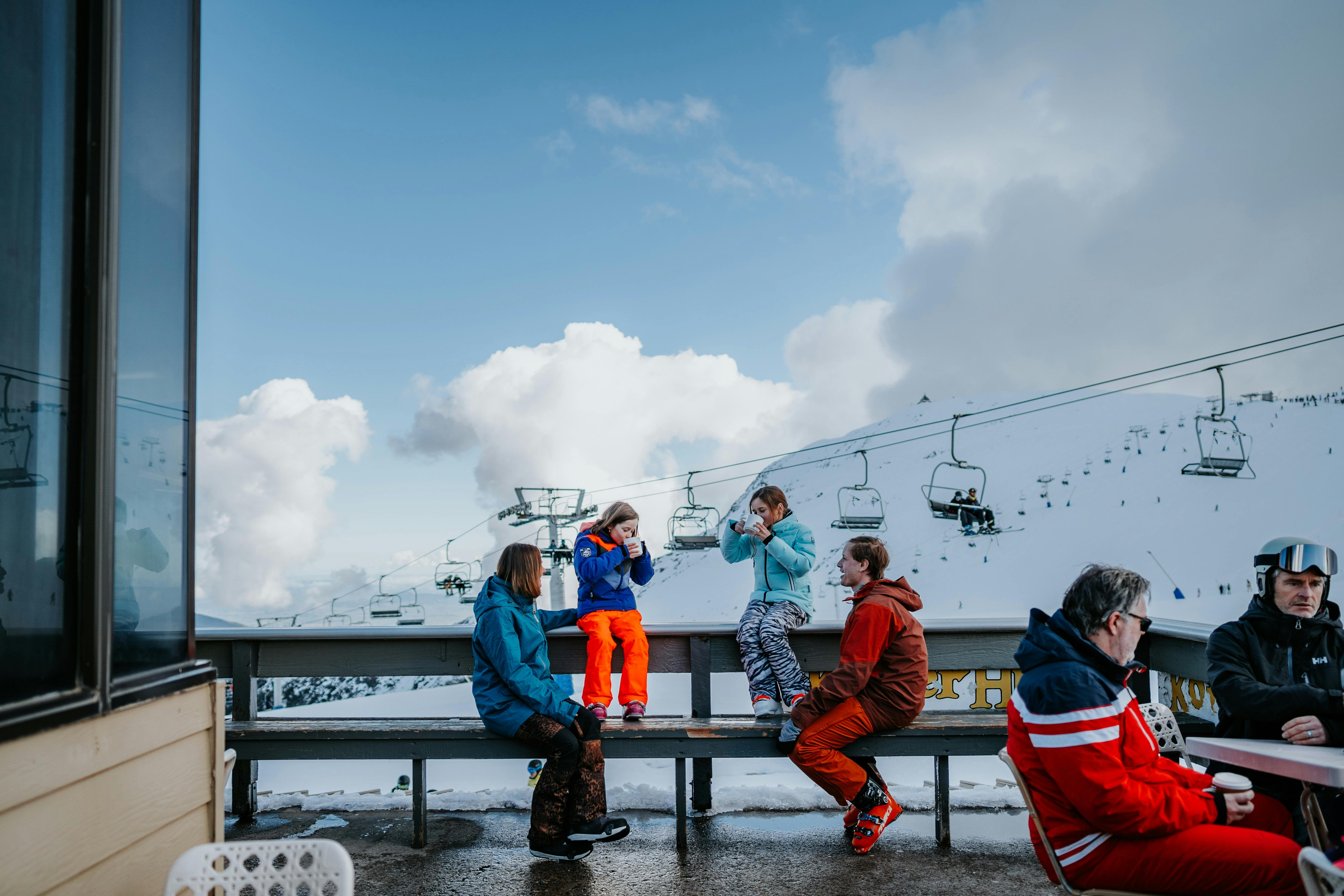 Warming up with a hot chocolate by the lifts at Mt Buller