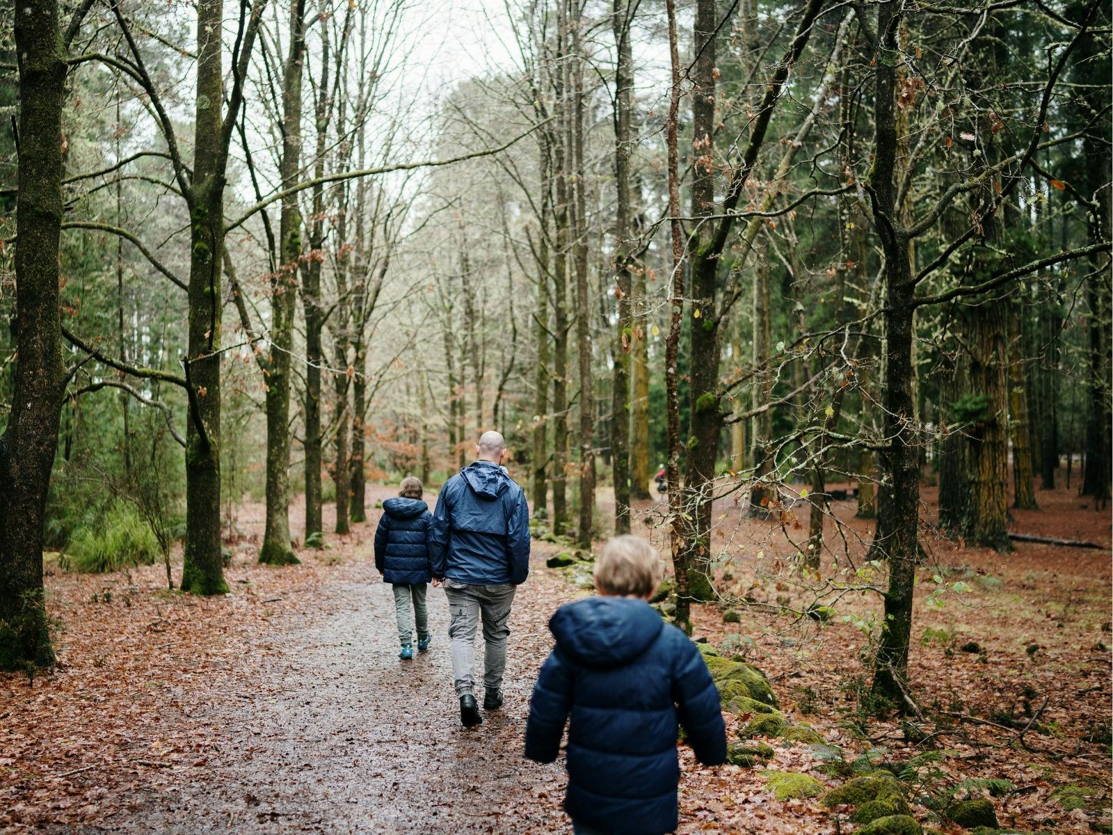A family walking outside in winter
