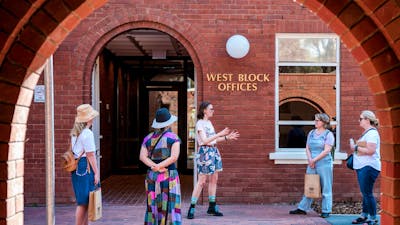 Local guide in Canberra walking with group