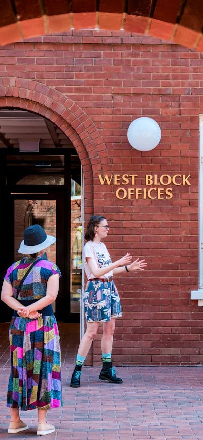 Local guide in Canberra walking with group