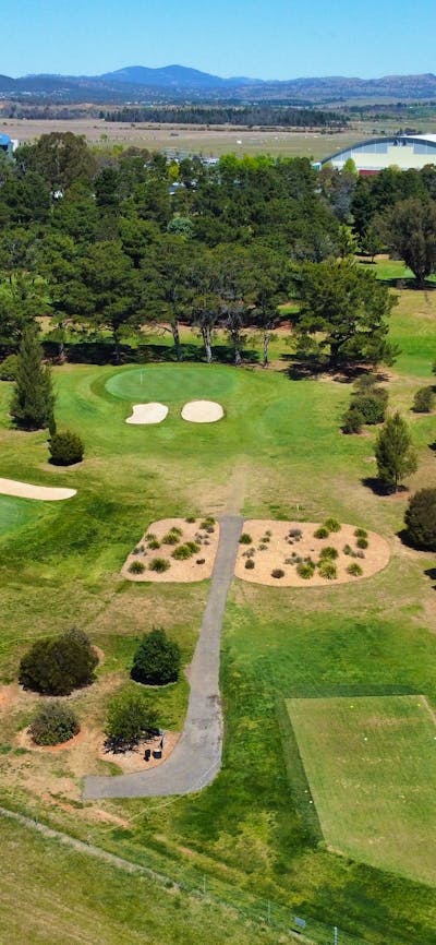 11th green and 12th hole showing proximity to the airport and views to the Brindabellas