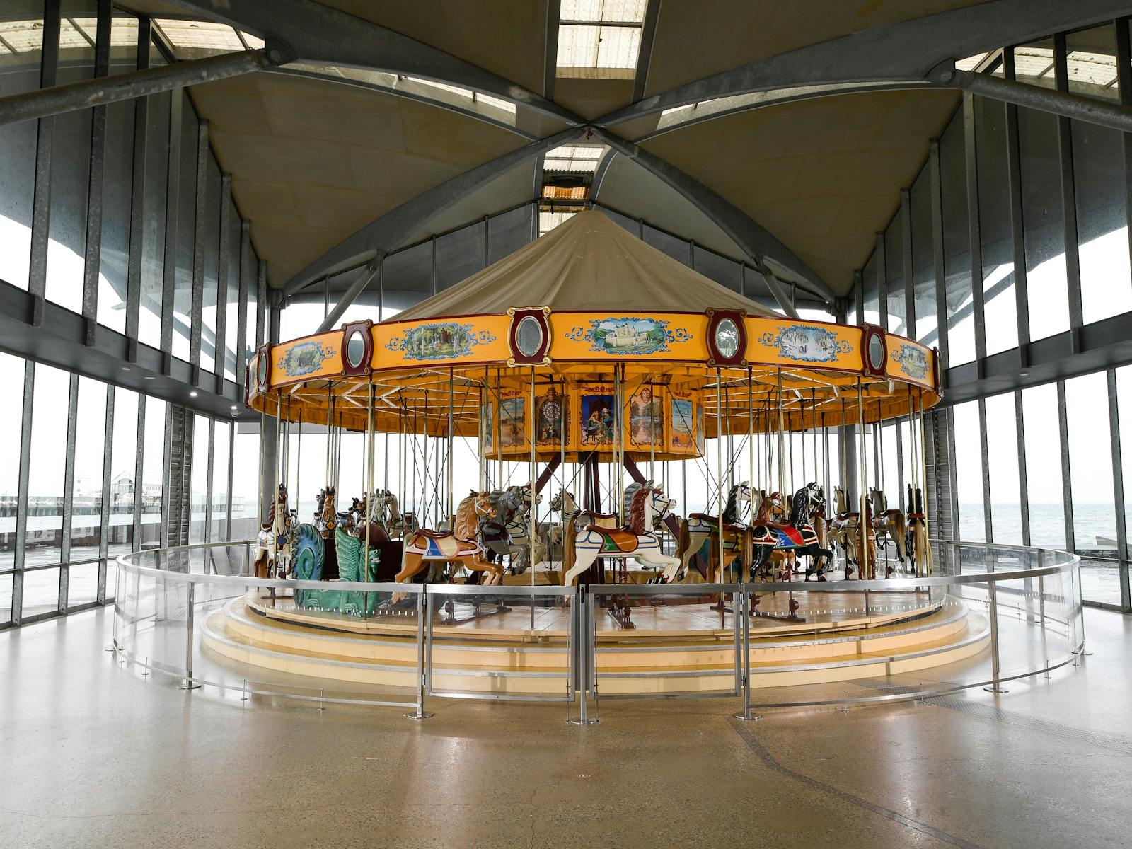 A photo of The Carousel with Corio Bay in the background through large glass windows