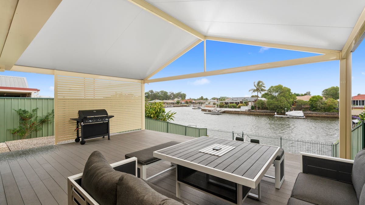 Outdoor entertaining area with canal views
