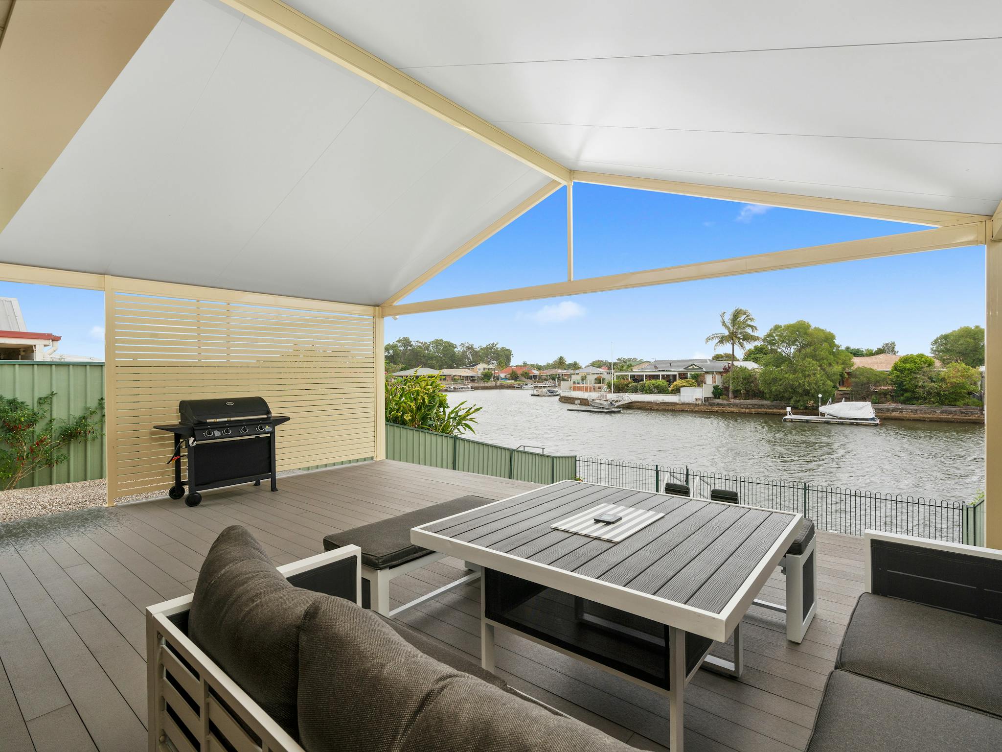 Outdoor entertaining area with canal views Outdoor entertaining area with canal views
