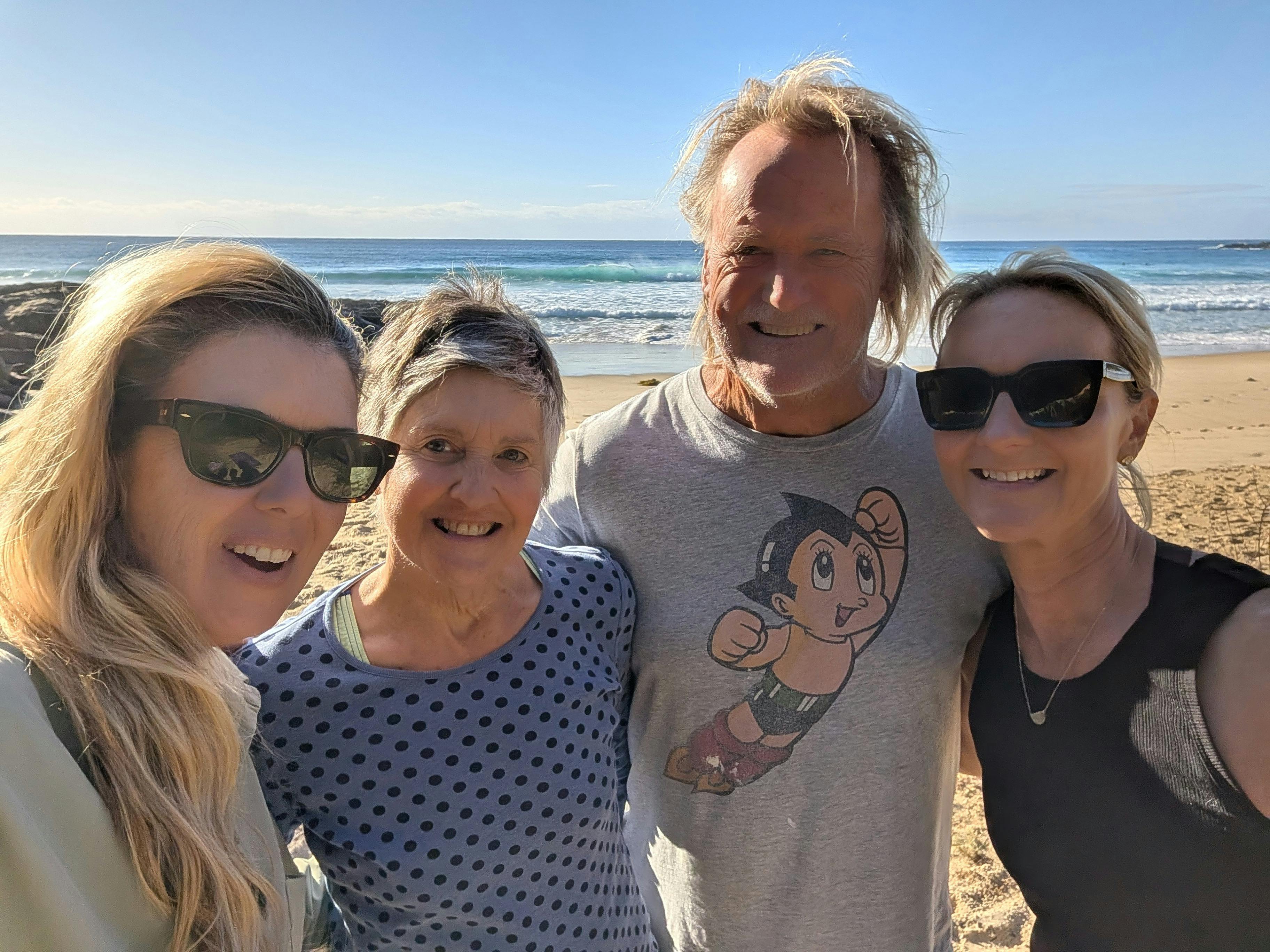 Post-practice joy on the sand at Simply Barefoot Ocean Wellness, Potato Point.