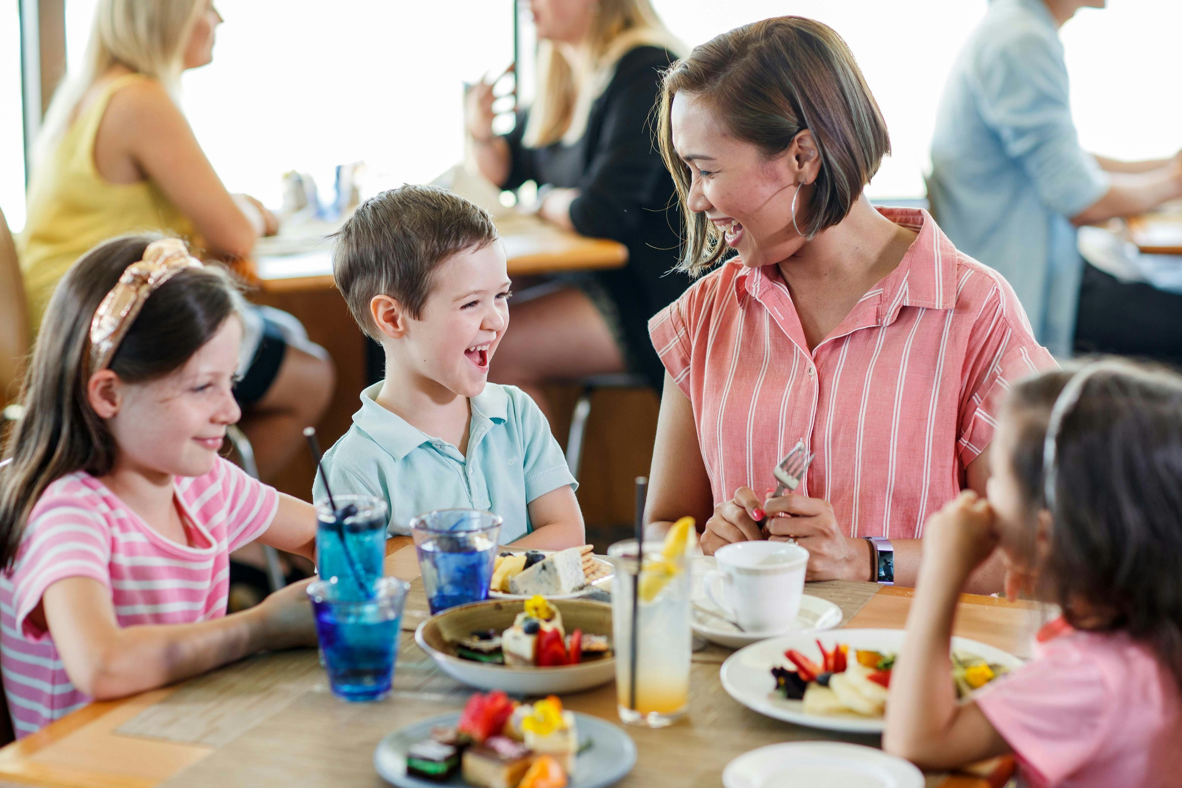 Family enjoying lunch onboard Sydney 2000