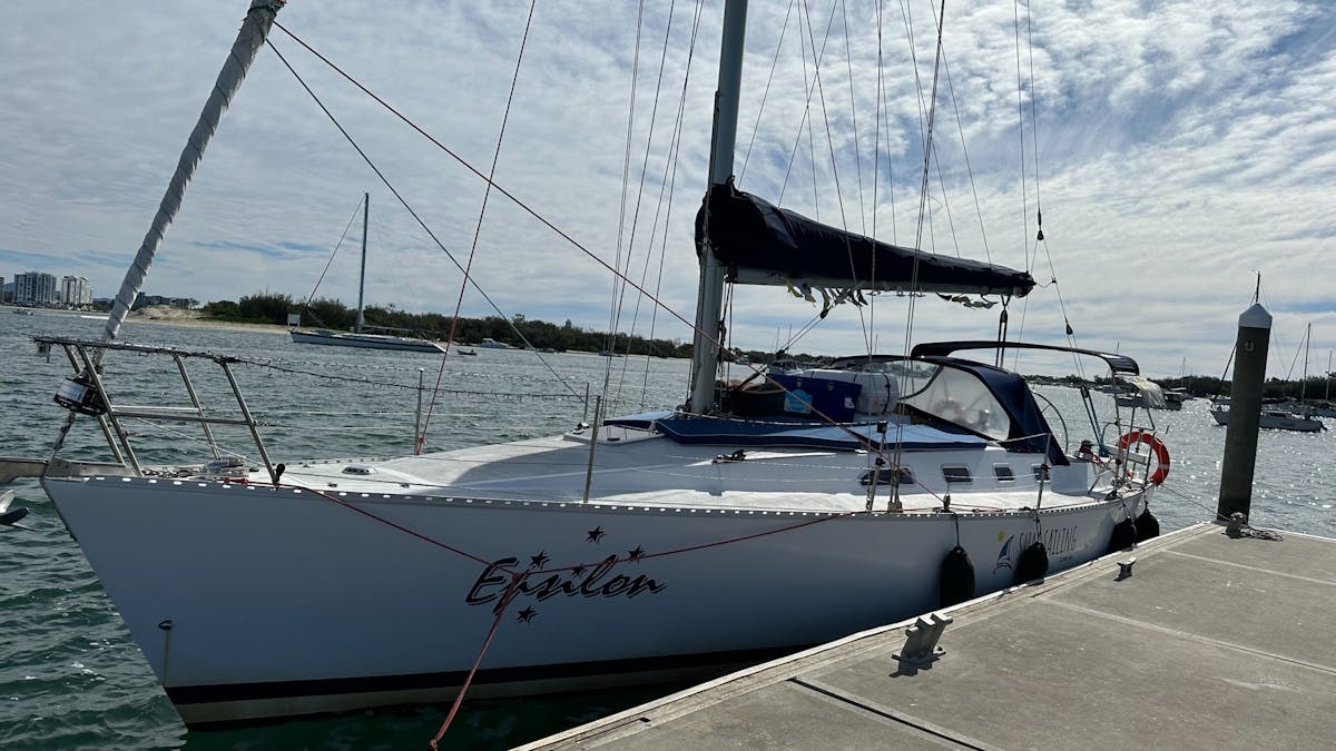 Sun Sailing's 38ft yacht Epsilon, tied to dock waiting for guests to arrive for sunset sailing trip.