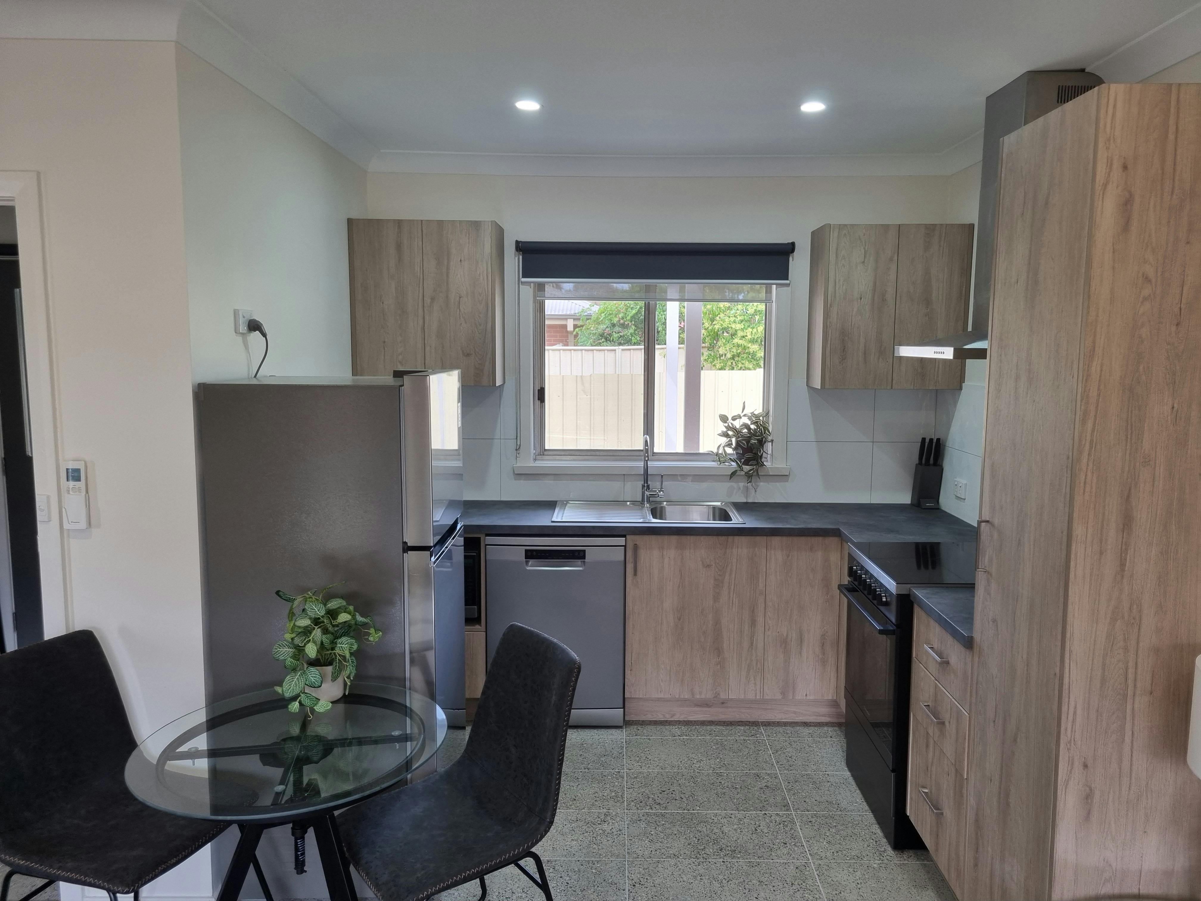 Kitchen, oven, full size fridge, dishwasher, microwave, coffee pod machine