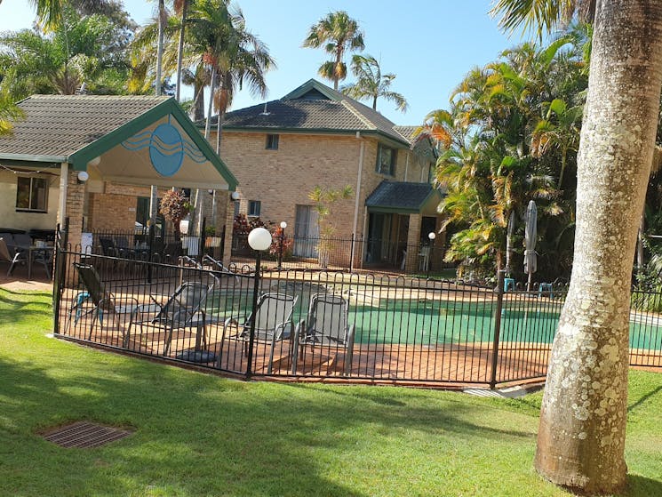 FULLY FENCED POOL WITH DAY BED AND LOUNGES