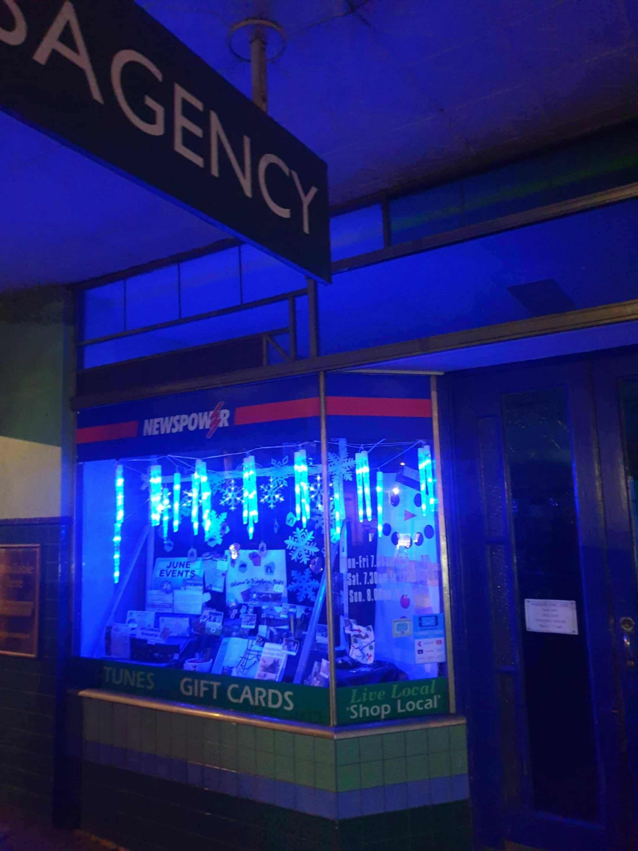 Pretty blue lights in a window display at Bridgetown Newsagency