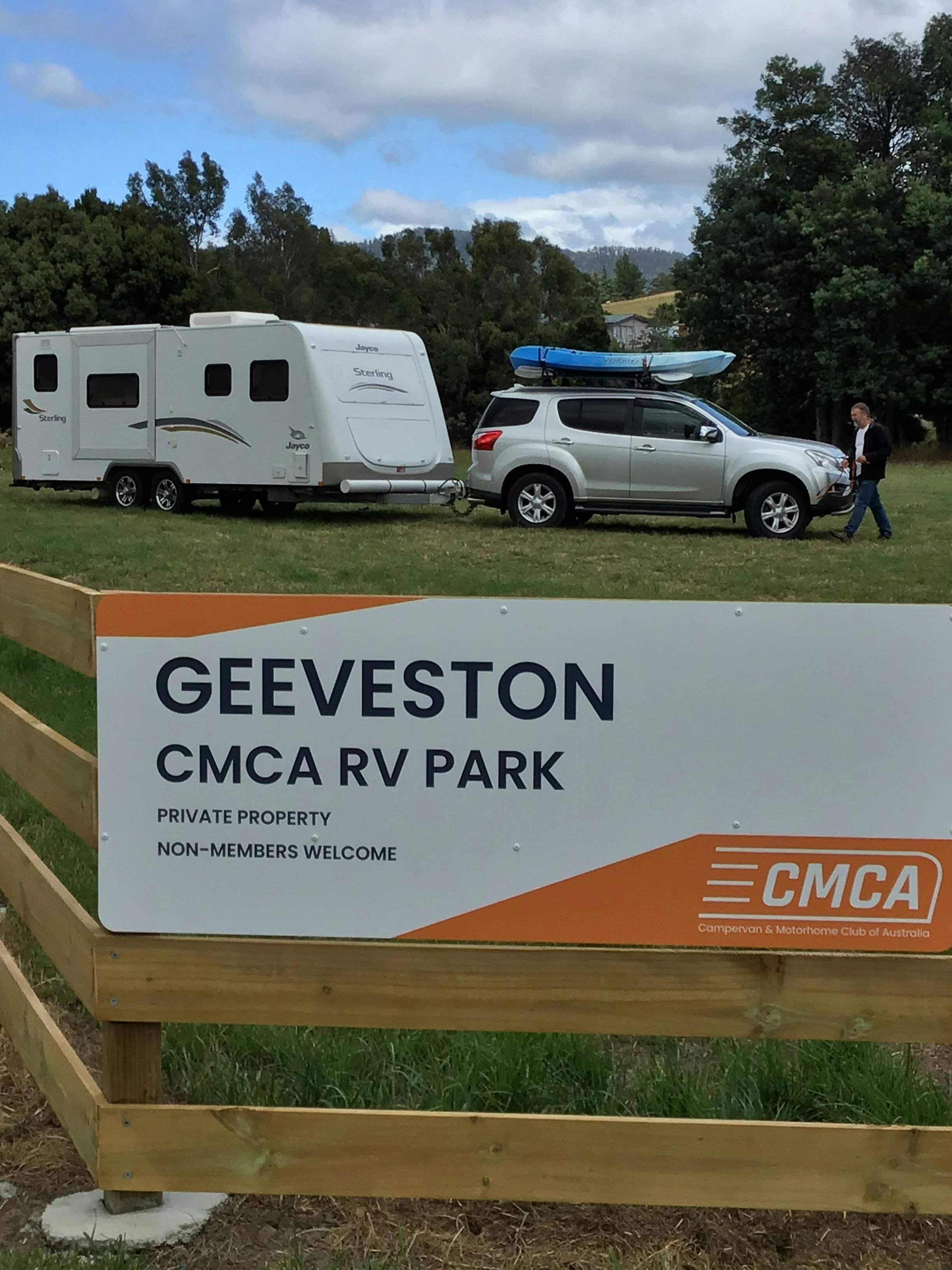 Entrance sign on fence